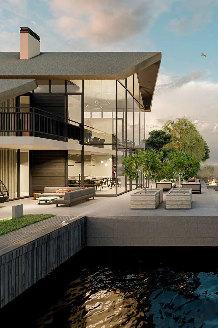 architectonisch ontwerp rietgedekte villa aan het water met aanlegsteiger