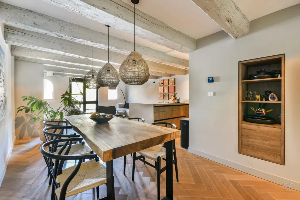 Plamen van Dijk | Design Studio – interieurarchitect - interieurontwerp van woonkamer en open keuken met warme sfeer in monumentaal pakhuis