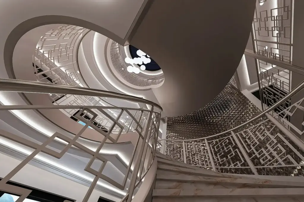 3D visualisatie van dynamisch perspectief vanaf onderzijde trap, waarin de doorgaande vide, gebogen trappen, maatwerkbalustrades en verlichte plafondranden als één ruimtelijk geheel zijn ontworpen.